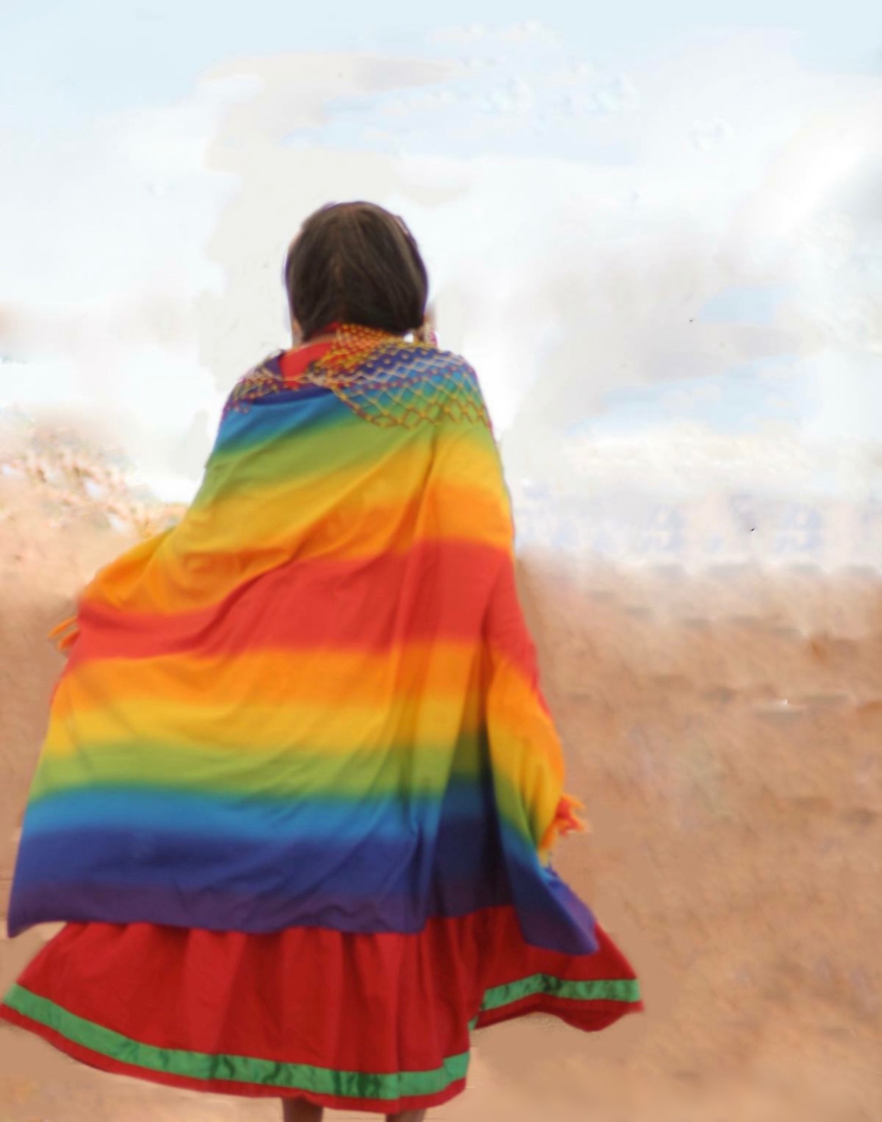 Back of girl dressed in rainbow colored garment